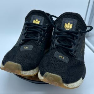 NMD adidas 4Y kids, black and gold.